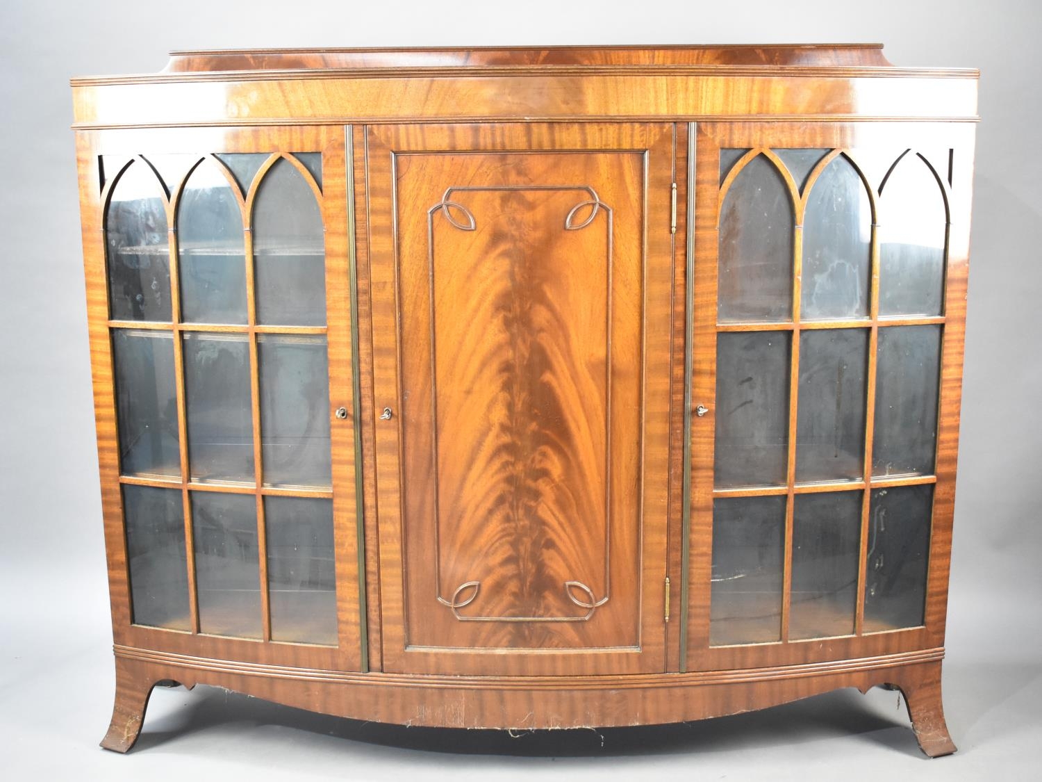 A Mid 20th Century Mahogany Sideboard Cabinet with Galleried Back, the Central Cupboard Flanked by