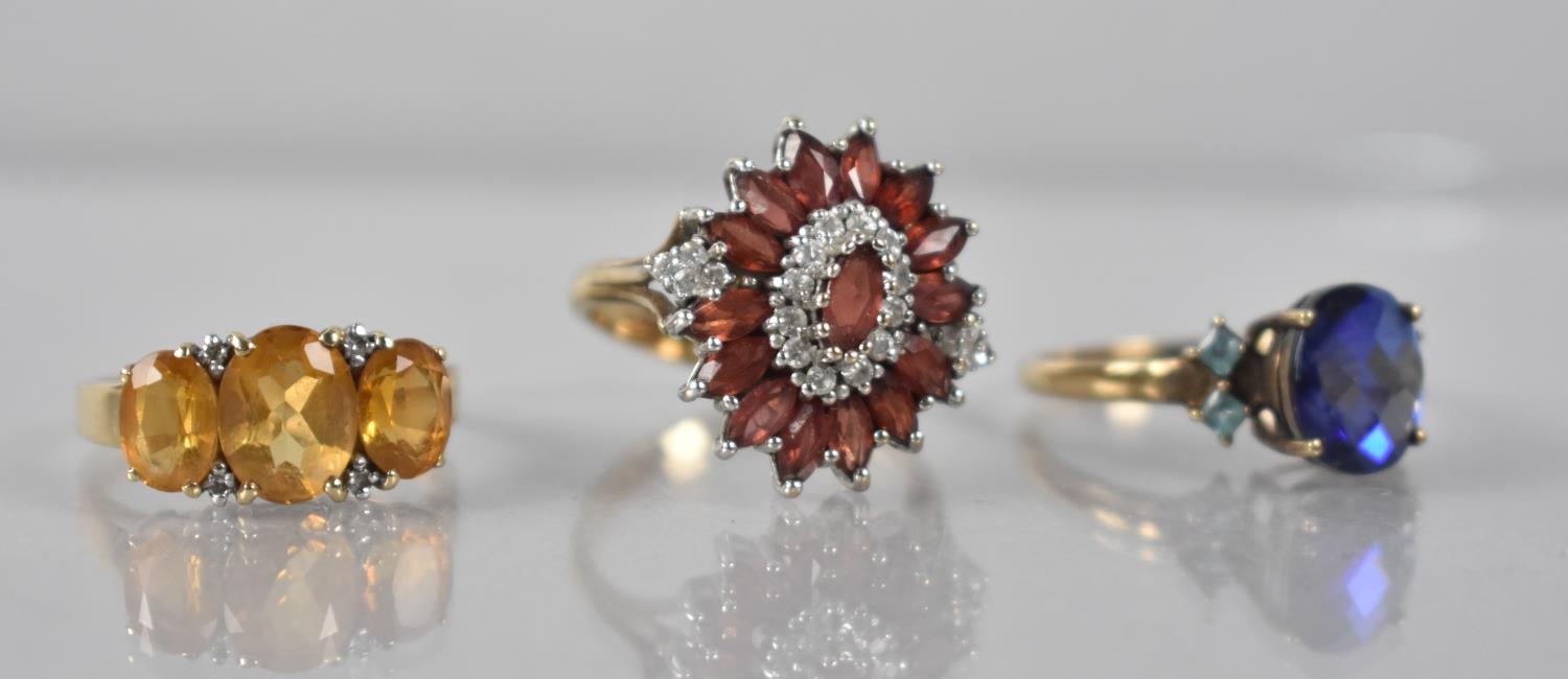 Three 9ct Gold Mounted jewelled Rings to include Citrine, Garnet Mounted Examples, 11.4gms, Sizes O,