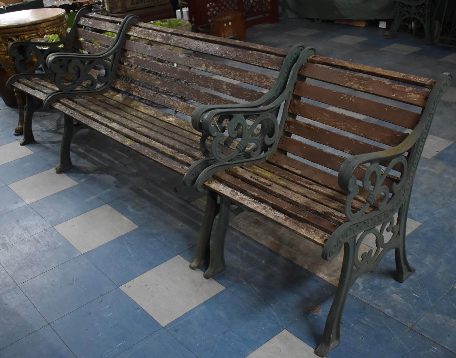 A Cast Iron Ended and Wooden Slatted Garden Bench and Two Matching Chairs, Bench 127cm