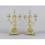 A Pair of Ornate Brass Three Branch Candelabra Garnitures with Pierced Supports Surmounted by