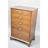 A Mahogany Chest of Five Short Drawers on Bracket Feet having Drop Cast Handles with Urn Motif,