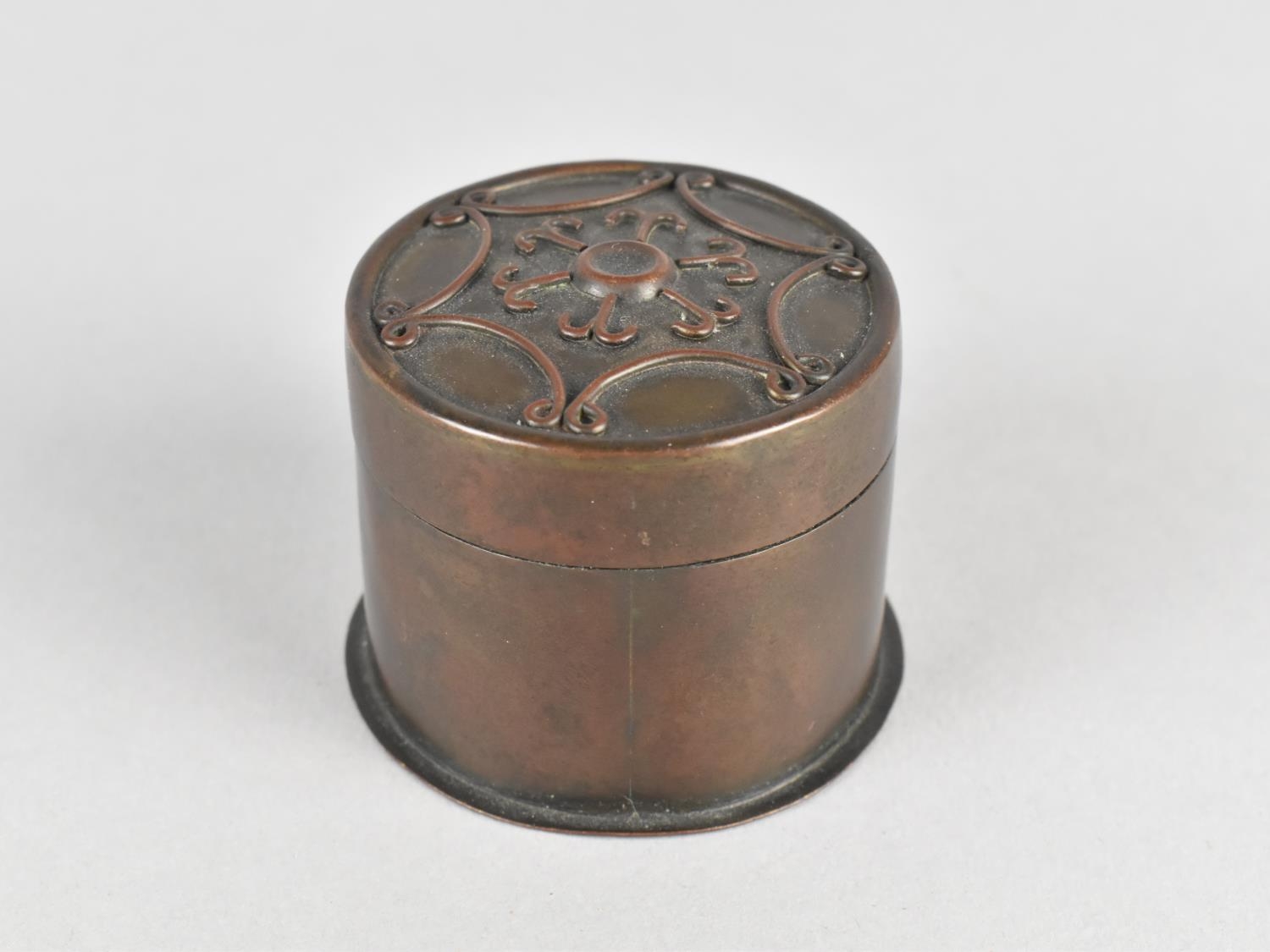 A Small Bronze Circular Trinket Box, the Lid with Relief Fleur De Lys Motif, 4cms High