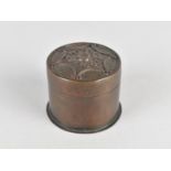 A Small Bronze Circular Trinket Box, the Lid with Relief Fleur De Lys Motif, 4cms High