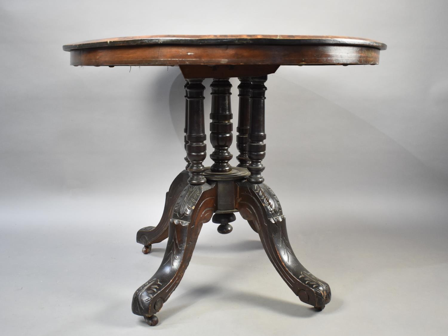 A 19th Century Mahogany String Inlaid Loo Table with Carved Quadrant Supports, Top with Urn Inlaid - Image 3 of 3