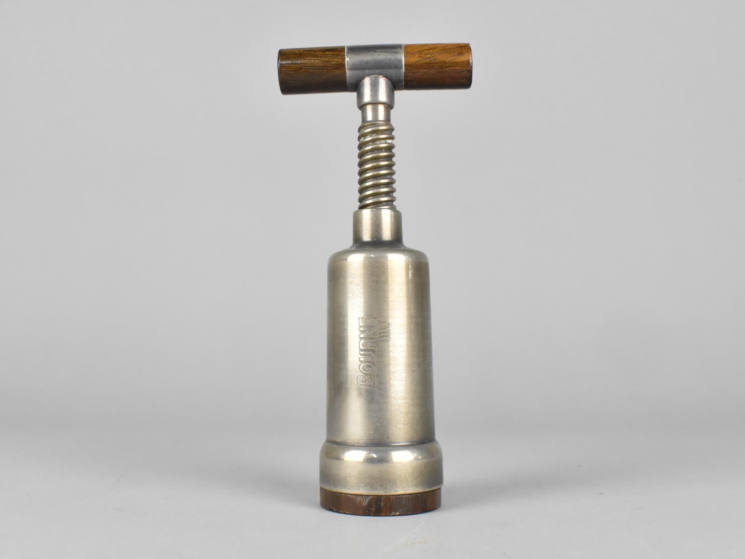 A Mid 20th Century Italian Scaroni Silver Plate and Wooden Corkscrew with Twist Action, 15cms High