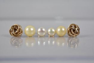 A Pair of Yellow Metal 'Knot' Earrings, 2gms, a 9ct Gold Mounted Pearl Earrings and Three Additional