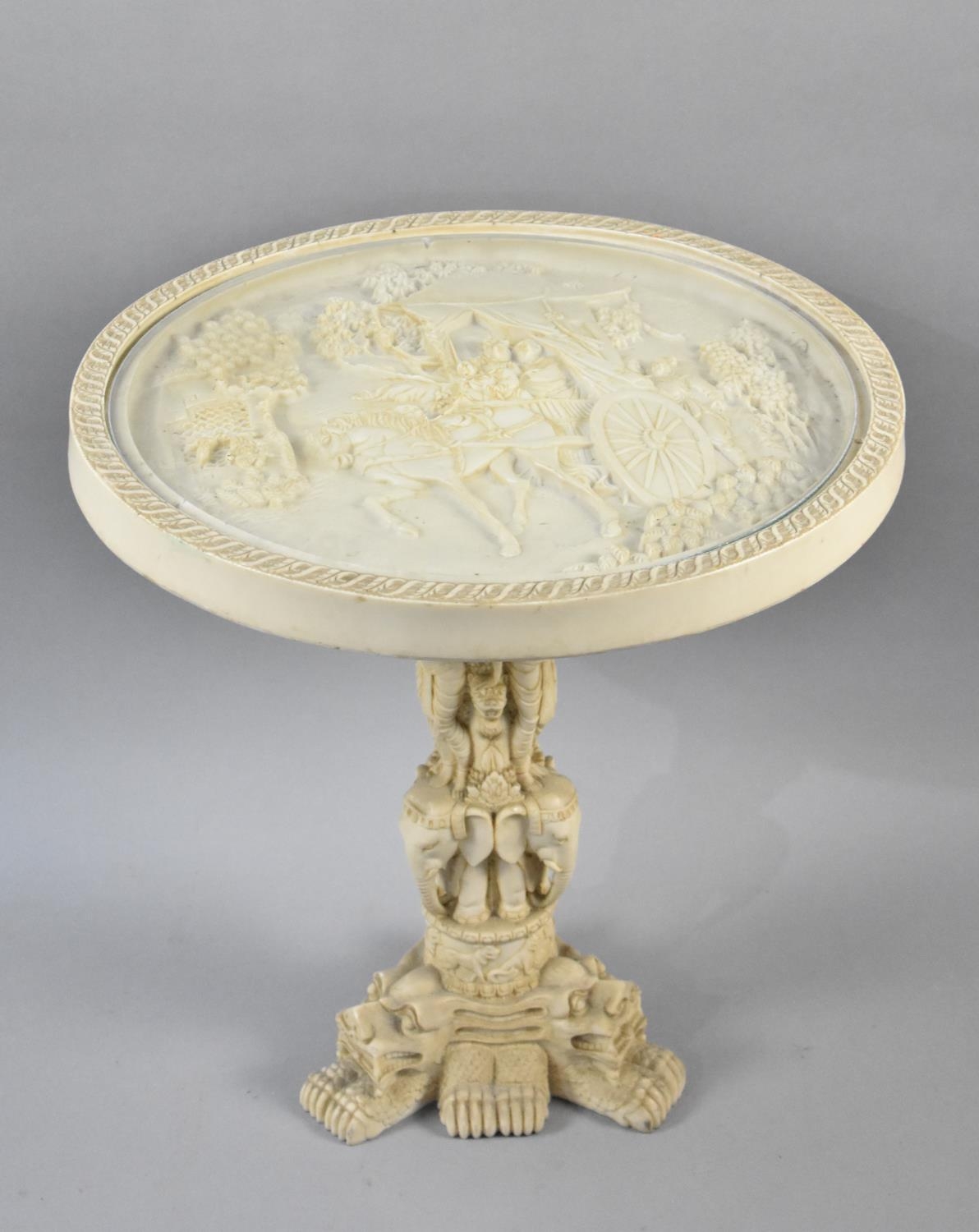 A Chinese Style Faux Ivory Circular Topped Table Decorated in Relief to Top with Cart Horse and