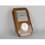 An Edwardian Oak Cased Aneroid Barometer