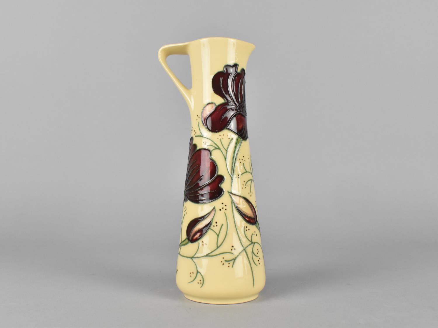 A Moorcroft Ewer Jug, Chocolate Cosmo Pattern, 18.5cm high