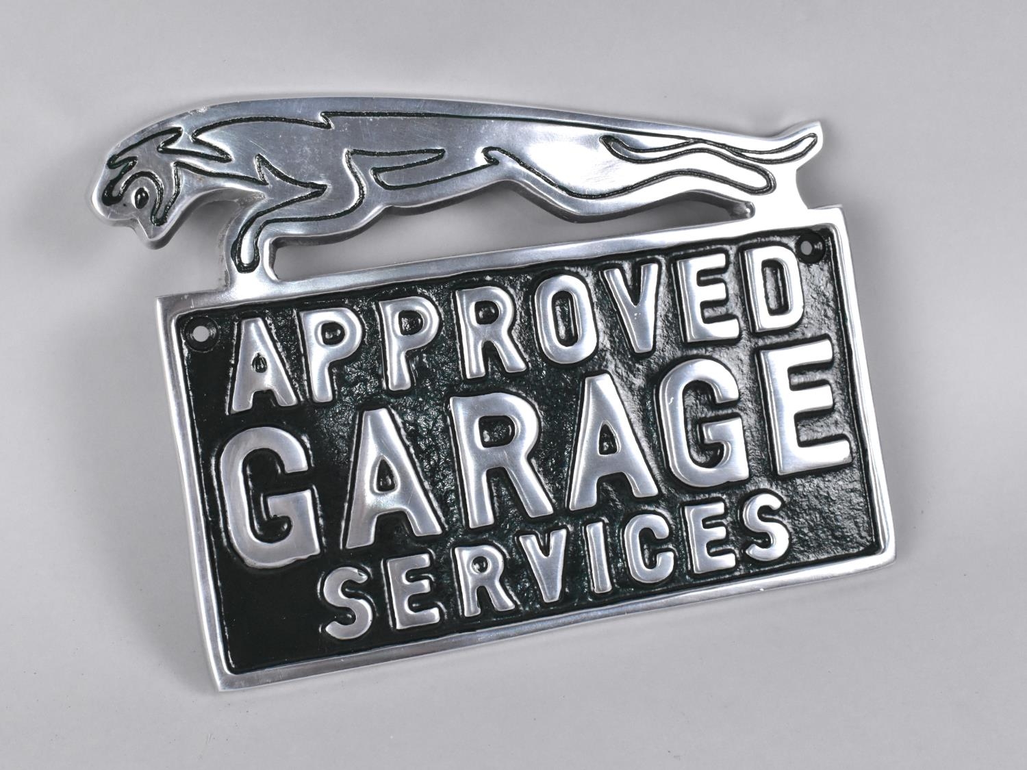 A Reproduction Cast Metal Sign for Jaguar, "Approved Garage Services", 23cms Wide, (Plus VAT)