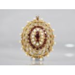 A 9ct Gold, Garnet and Pearl Brooch/Pendant of Oval Pierced Form by Zeeta, Central Round Cut