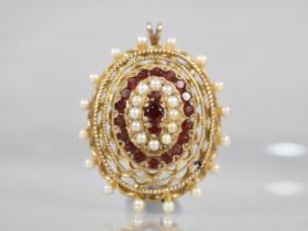 A 9ct Gold, Garnet and Pearl Brooch/Pendant of Oval Pierced Form by Zeeta, Central Round Cut