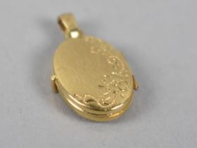 An 18ct Gold Miniature Locket, 11.9x17mm, 1gm
