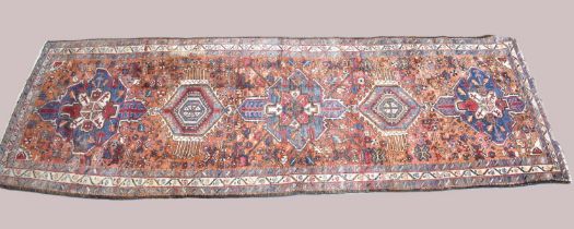 A Persian Handmade Heriz Runner, 328x110cms