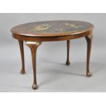 A Chinoiserie Oval Coffee Table with Painted Oriental Landscape Scene, 59cms Wide