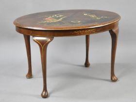 A Chinoiserie Oval Coffee Table with Painted Oriental Landscape Scene, 59cms Wide