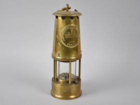 A Brass Miners Lamp by The Protector Lamp & Lighting Co, Eccles Type 6, 25cms High