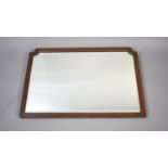 An Oak Framed Bevelled Edge Wall Mirror with Canted Corners