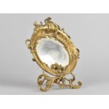 A Small Ornate Cast Brass Dressing Table Mirror of Circular Form with Floral and Scrolled