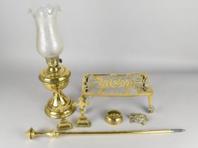 A Collection of Various Brass to Comprise Oil Lamp, Trivet Stand with Tiger Motif, etc