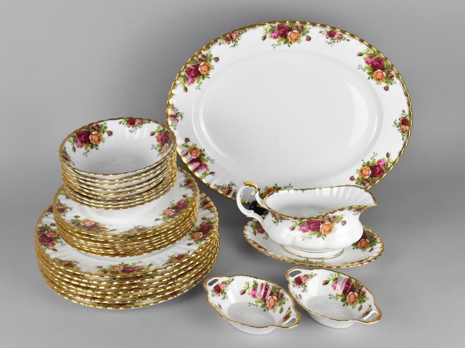A Royal Albert Dinner Service to Comprise Large Platter, Sauce Boat (Piece Glued) and Stand, Seven