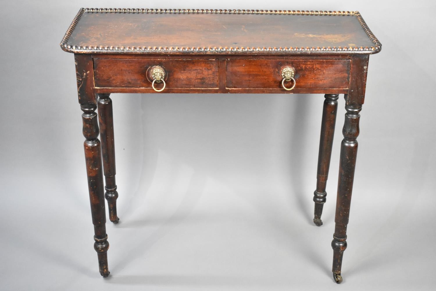 A Late 19th/Early 20th Century Mahogany Side Table with Two Short Drawers Having Lion Mask Ring