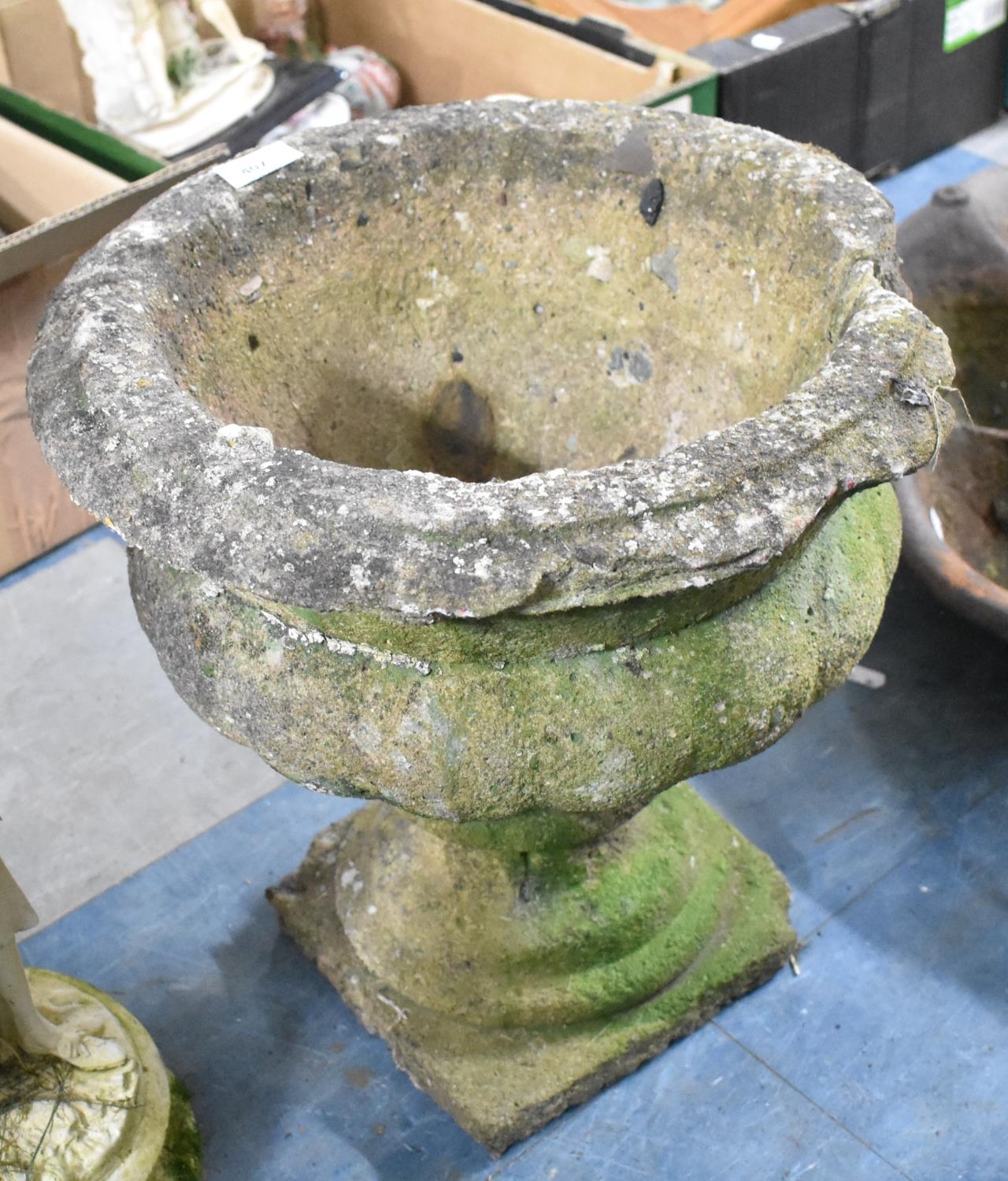 A Reconstituted Stone Garden Planter of Urn Form, 40cms High (Condition issues)