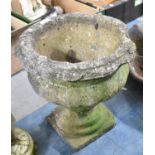 A Reconstituted Stone Garden Planter of Urn Form, 40cms High (Condition issues)