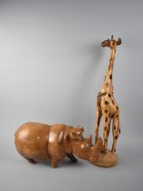 Two African Wooden Ornaments, Giraffe and Rhino, 62 and 20cms High, Condition Issues