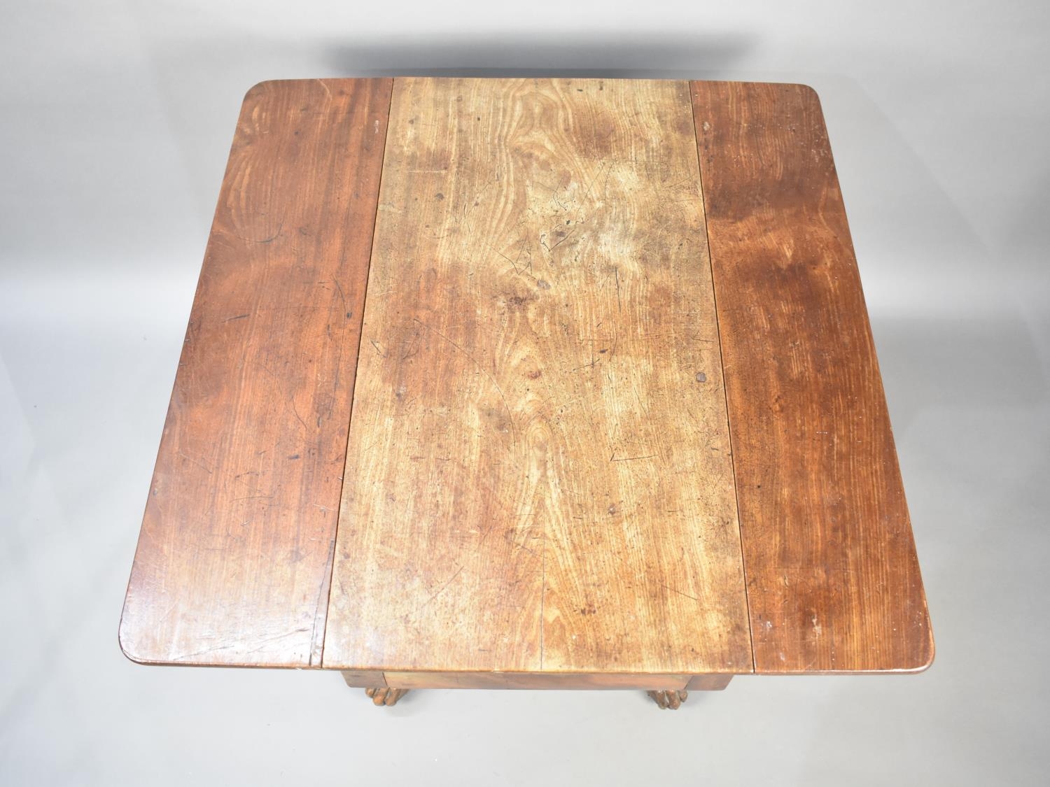 A 19th Century Mahogany Drop Leaf Table on Splayed Quadrant Reeded Supports Culminating in Paw Feet, - Image 2 of 3