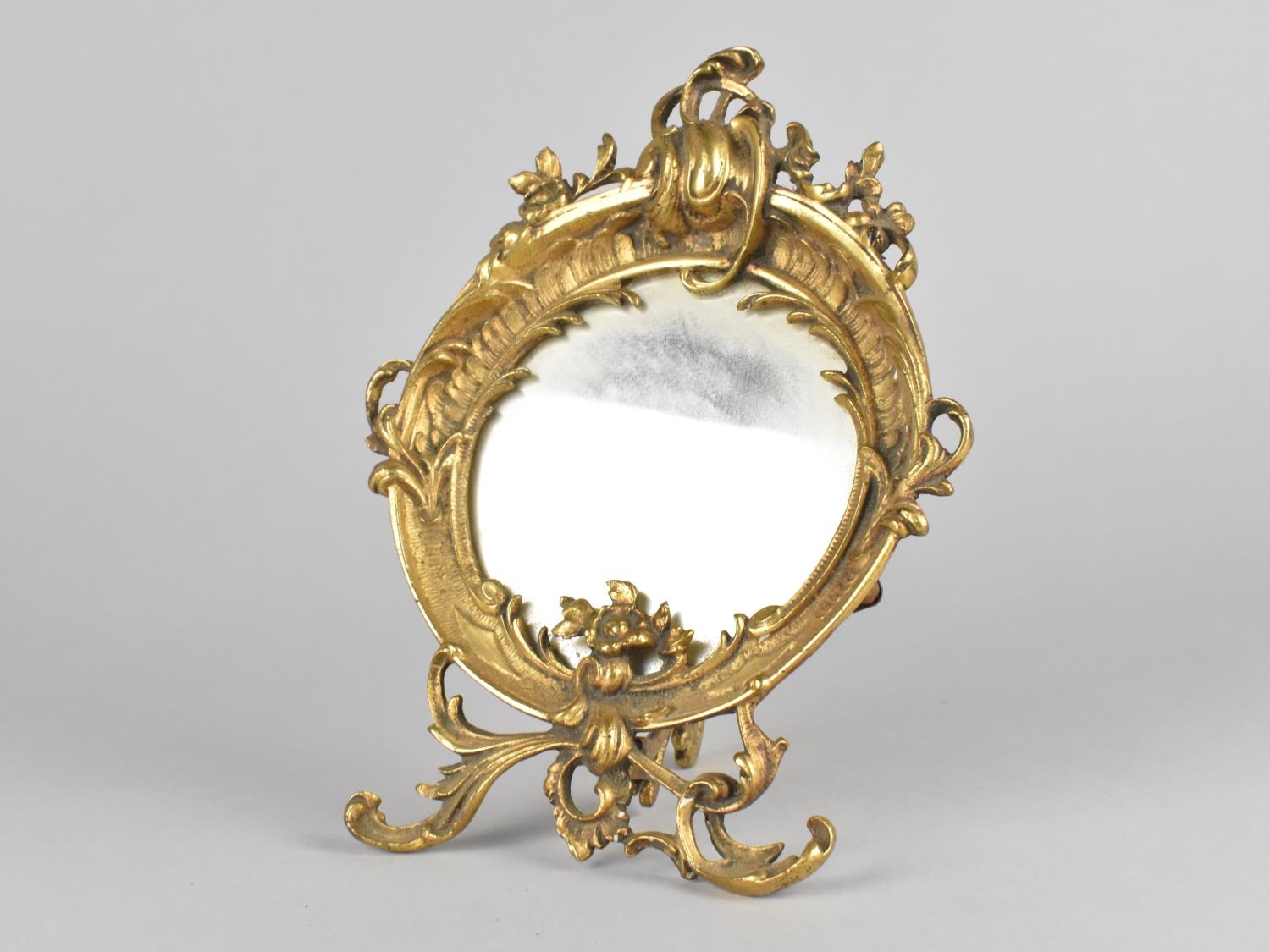 A Small Ornate Cast Brass Dressing Table Mirror of Circular Form with Floral and Scrolled - Image 4 of 4