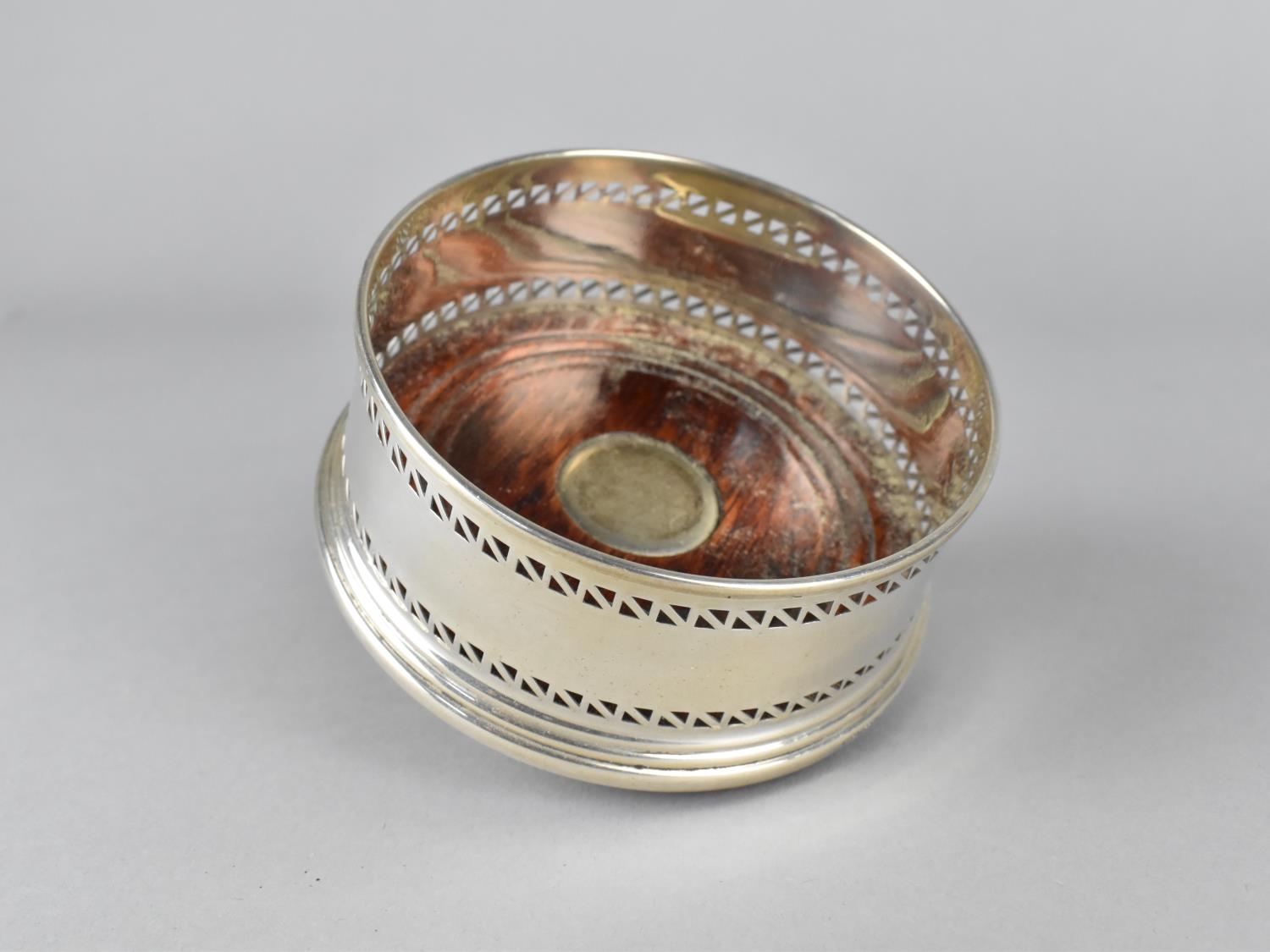 A Silver Bottle Coaster with Pierced Trim and Turned Wooden Base with Silver Mount, 9cm diameter - Image 2 of 3