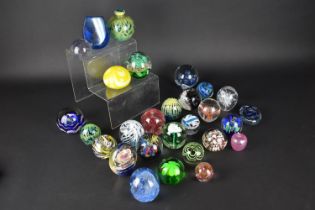 A Collection of Twenty-Eight Various Glass Paperweights to Include Examples by Mdina etc