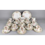 An Edwardian Floral Decorated Tea Set of Wrythen Form to Comprise Two Cake Plates, Twelve Side