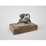 A Chinese Bronze Double Seal, Modelled with Mythical Qilin, 8x6x6cms High