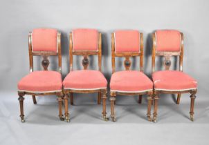 A Set of Four Late Victorian/Edwardian Mahogany Upholstered Seated Armchairs, Backs with Carved