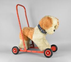 A Vintage Push Along Dog with Steel Frame and Rubber Tyres, 63cms High