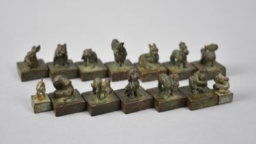 A Set of Twelve Plus Two Chinese Bronze Zodiac Seals, Each 3cms Tall