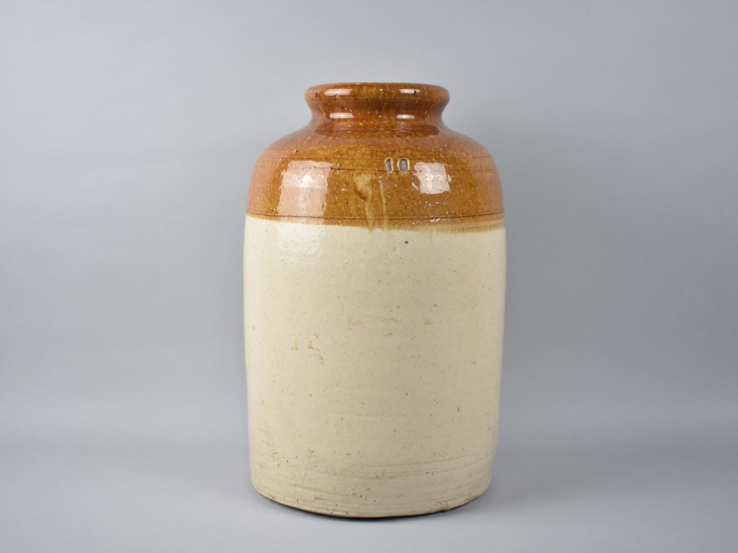 A Large Stoneware Glazed Jar with Incised Number 10, 37cms High