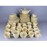 A Large Collection of Wood's Jasmine Yellow Glazed Tea and Dinner Wares