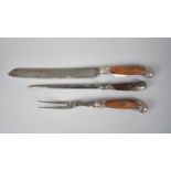 A Late 19th Century Horn handled Silver Mounted Carving Set by Harrison Brothers and Howson