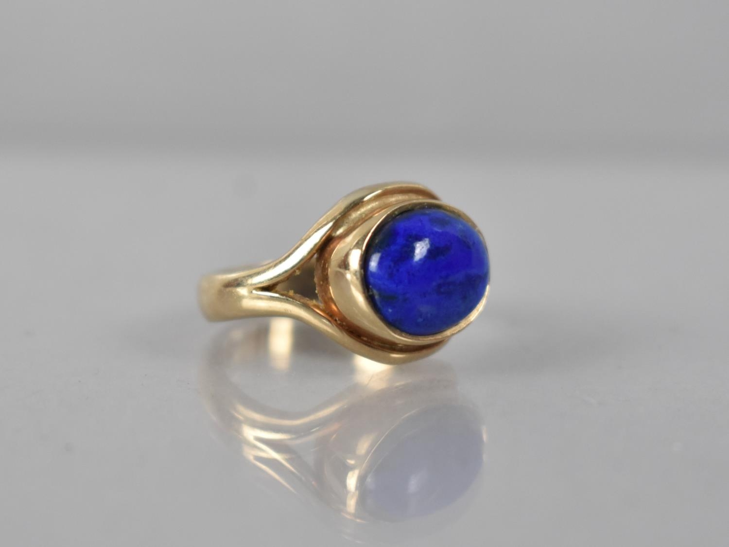 A Nice Quality Heavy Lapis Lazuli and 9ct Gold Mounted Ring, Oval Cabochon Stone 8.8mm by 11.4mm,