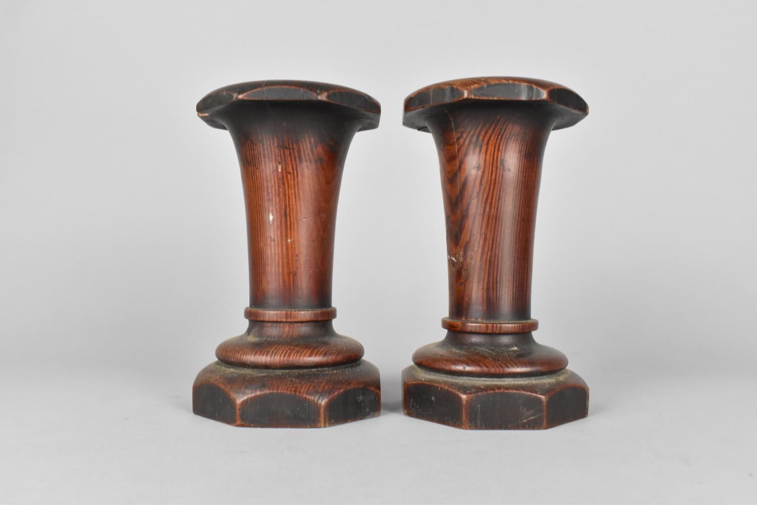 A Pair of Turned Mahogany Vases of Flared Form Supported on Octagonal Base, Varying Condition Issues