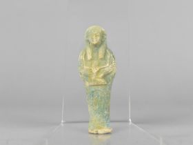 An Egyptian Blue Glazed Faience Ushabti Figure in Typical Mummified Form, 9cms High