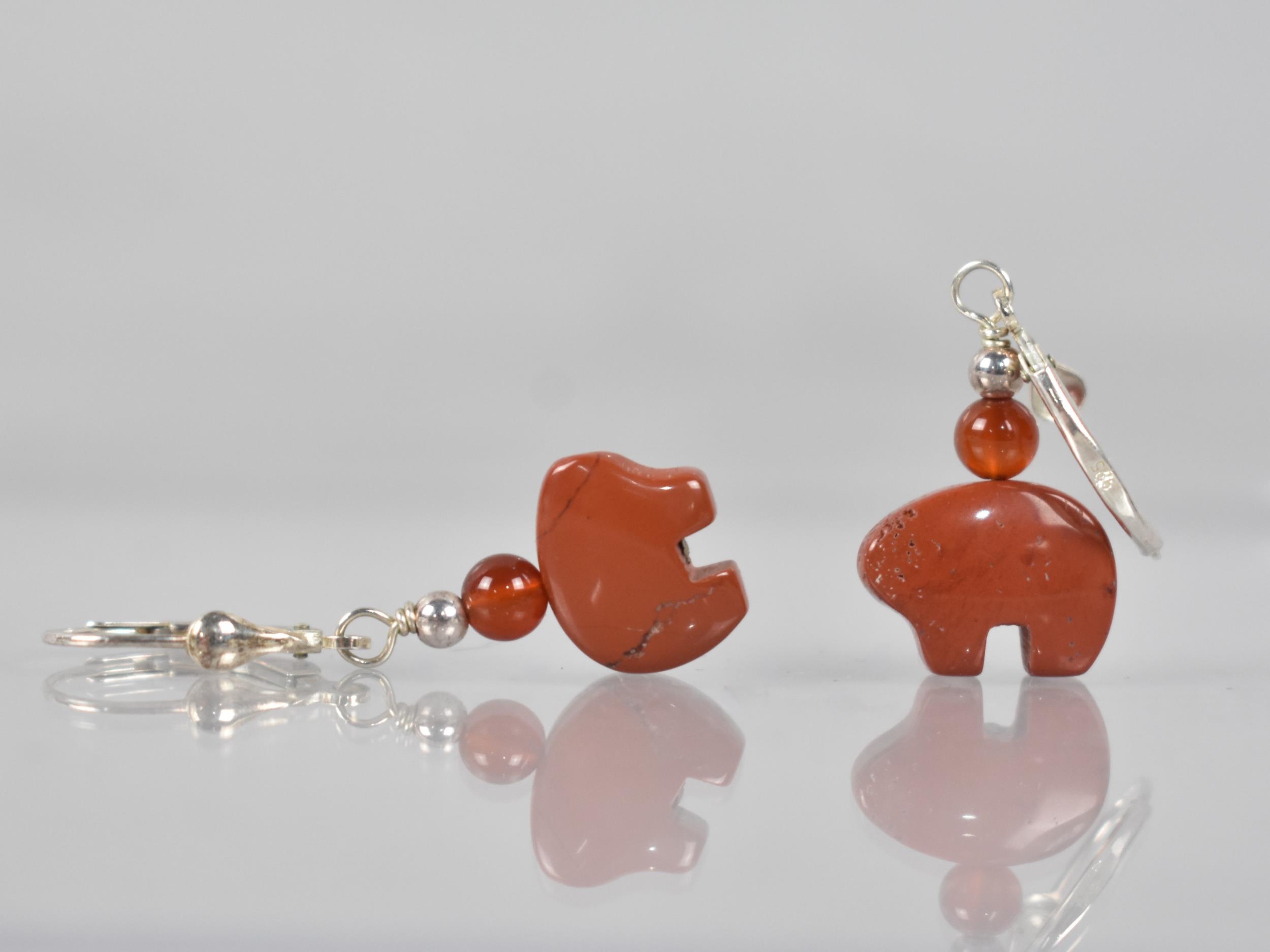 A Pair of Native American Red Jasper, Carnelian and Silver Earrings, Drops in the Form of a Bears,