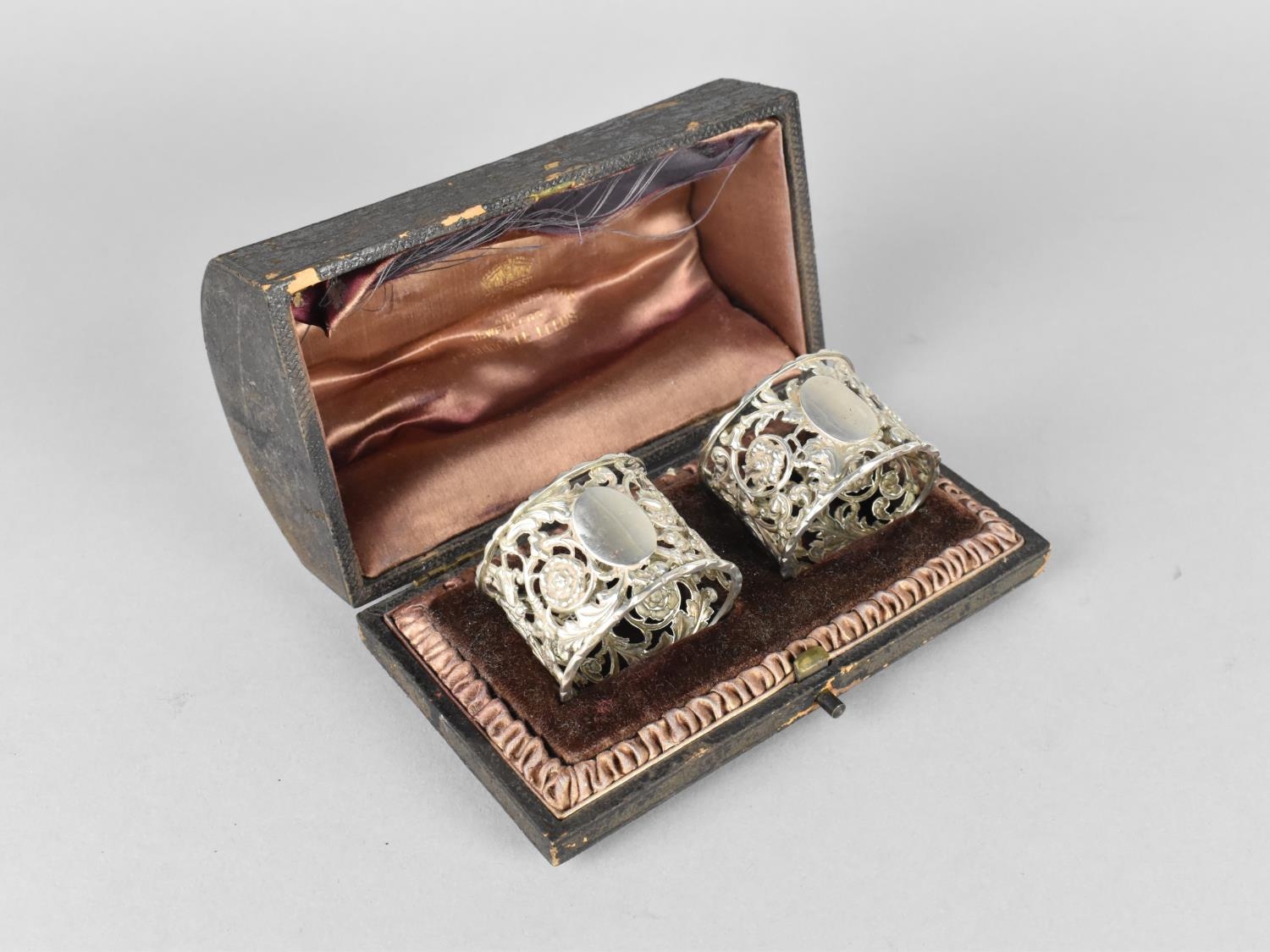 A Cased Set of Two Victorian Silver Napkin Rings with Pierced Foliate Design - Image 2 of 4