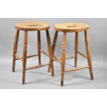 A Pair of Vintage Stools on Turned Tapering Supports with Box Stretcher and Oval Top with Central