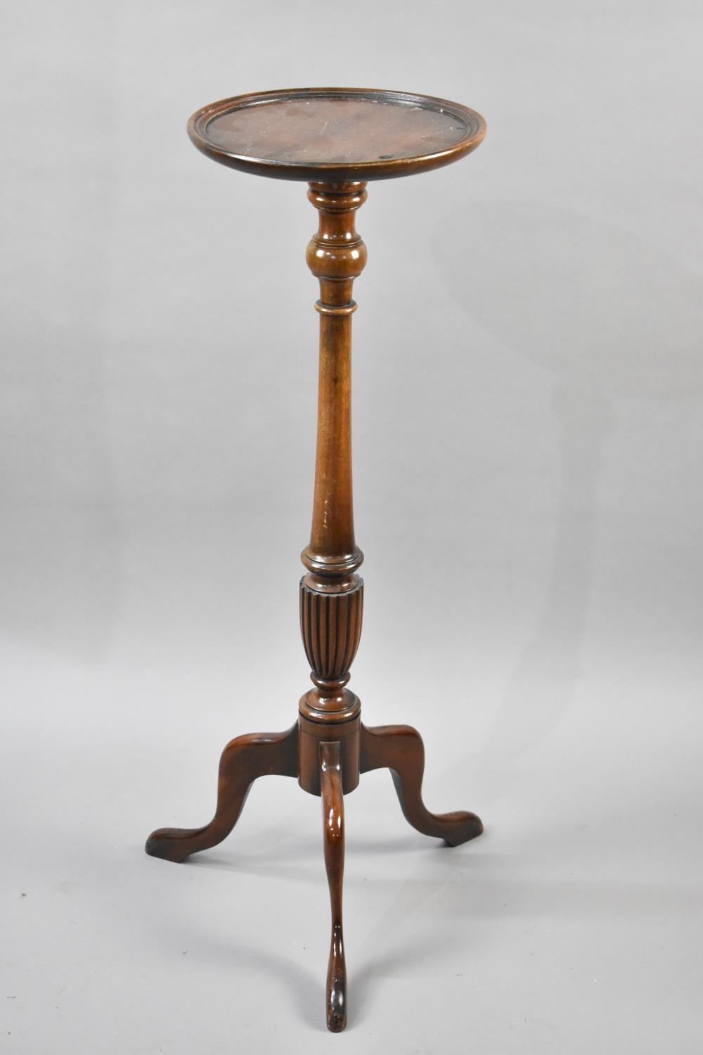 A Mahogany Torchere Stand with Circular Top having Turned Supports Culminating to Reeded Vase Base