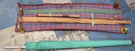 A Vintage Split Cane Royal Seal Brand Fishing Rod in Leather Case together with a Parasol