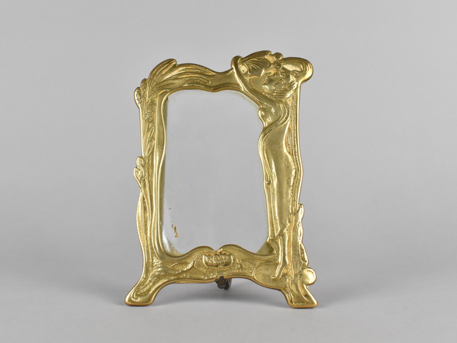 A Cast Brass Photo Frame in the Art Nouveau Style with Whiplash and Maiden Design, Hinged Support,